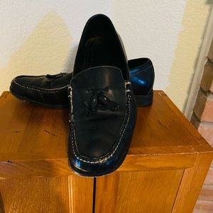 Cole Haan: size 8.5 black leather loafers with tassels.